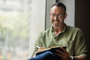Man writing in a notebook