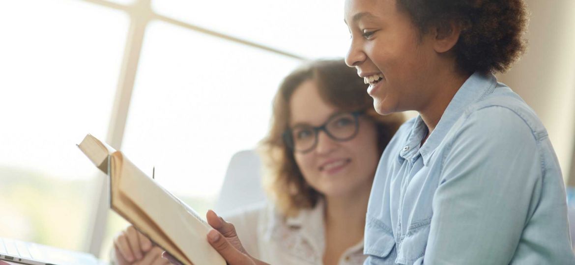Woman reading her story out loud to someone she trusts